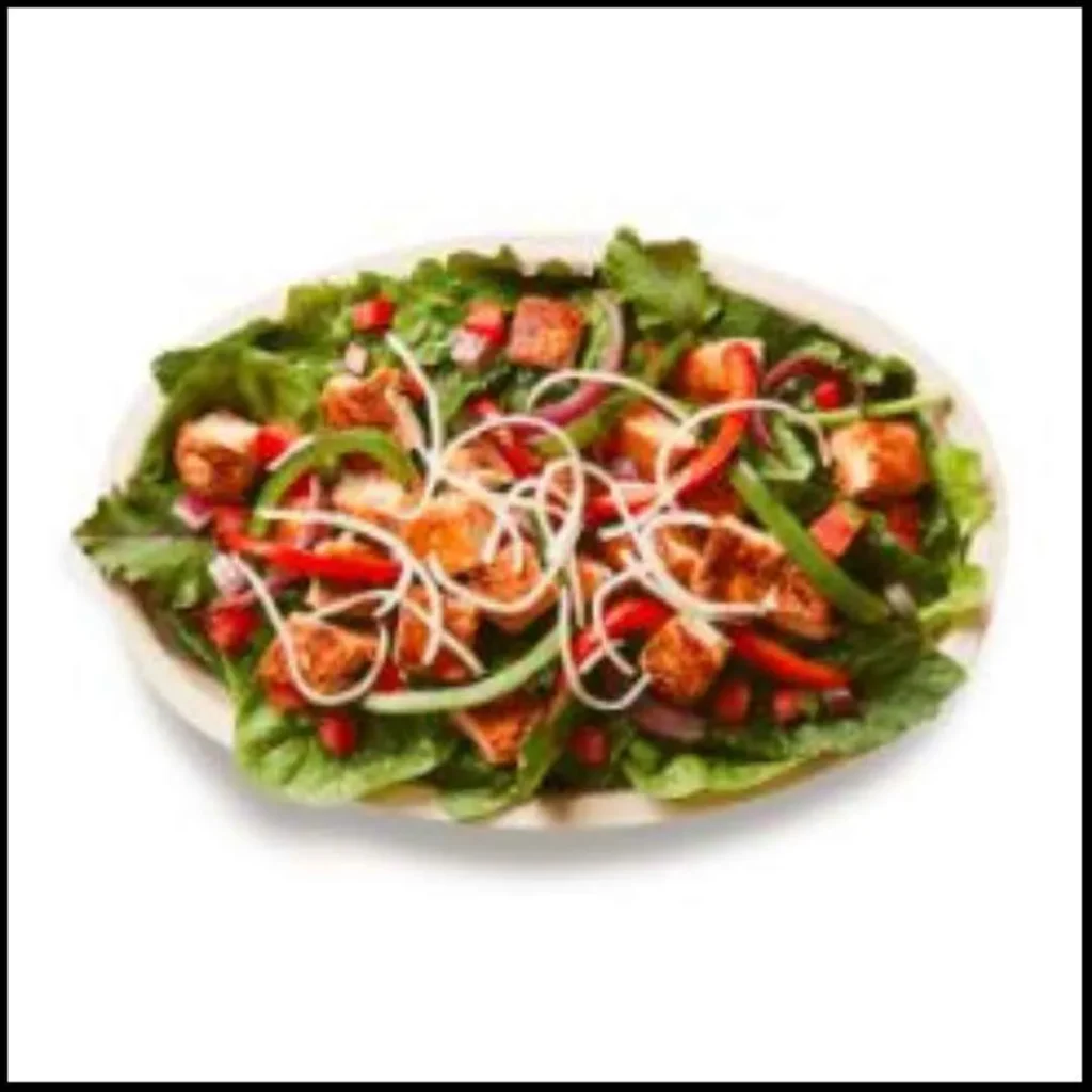 Chipotle Chicken Salad – Fresh & Flavorful Meal Option! Chipotle Chicken Salad with grilled chicken, fresh lettuce, onions, bell peppers, and tomatoes in a bowl.
