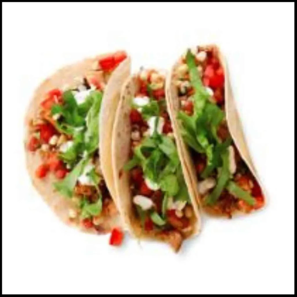 Chipotle Soft Tacos – Fresh & Flavorful Mexican Delight! Three Chipotle soft tacos filled with seasoned chicken, fresh lettuce, diced tomatoes, cheese, and sour cream.