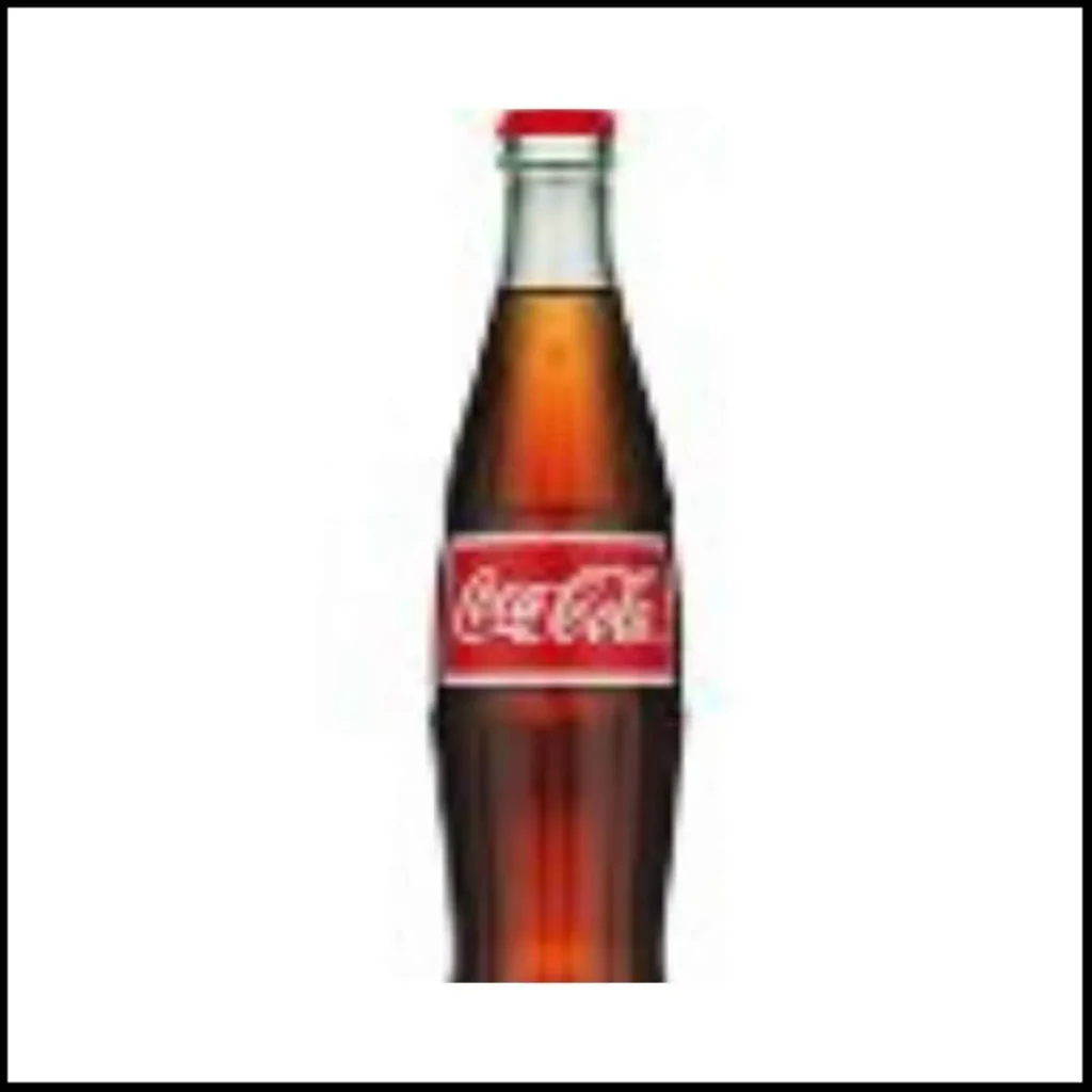 Mexican Coca-Cola – Made with Real Cane Sugar for a Classic Taste A classic glass bottle of Mexican Coca-Cola with a red label featuring the iconic Coca-Cola logo.