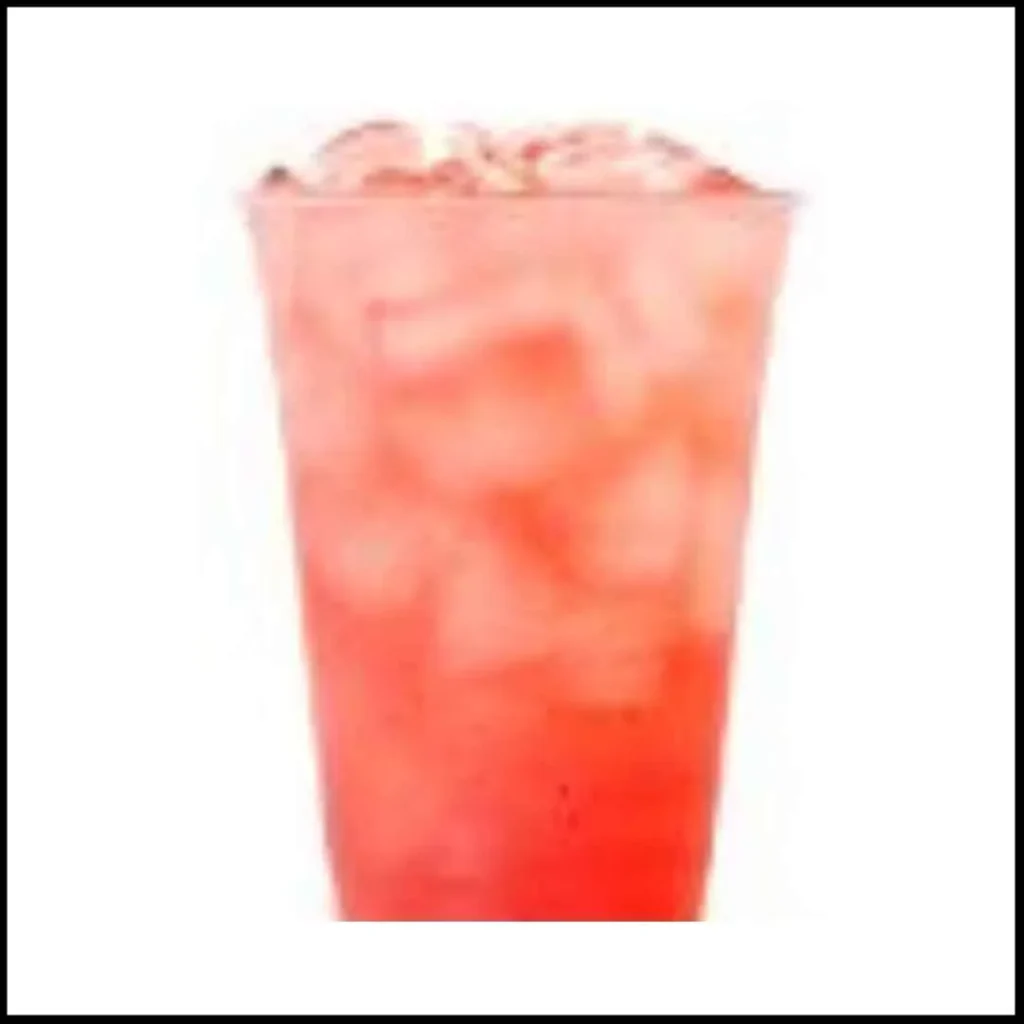 Organic Berry Agua Fresca – Refreshing Fruit Beverage with Ice A refreshing tall glass of organic berry agua fresca filled with ice, showcasing a vibrant red-pink hue.